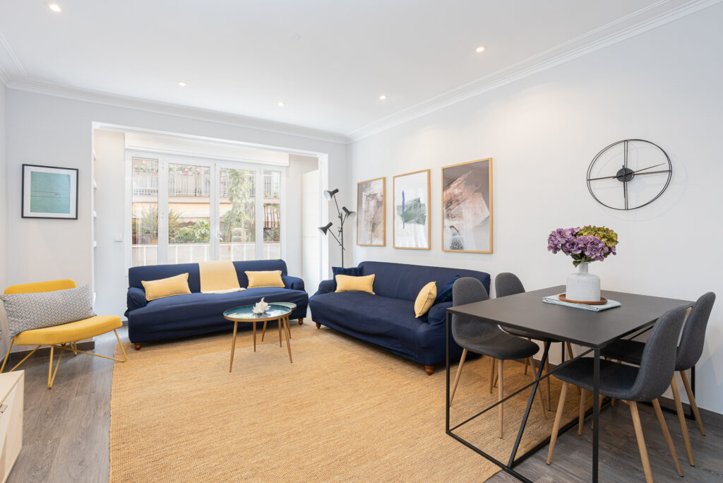 A living room with two couches and a table