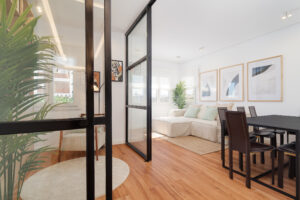 Modern living space with glass partition.