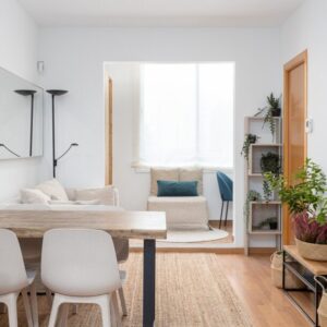Modern living room with dining area.
