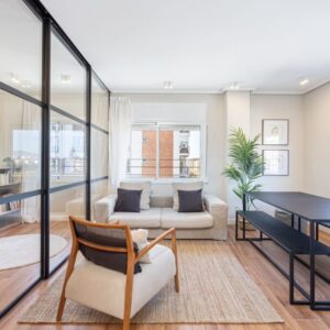 Cozy modern living room with natural light.